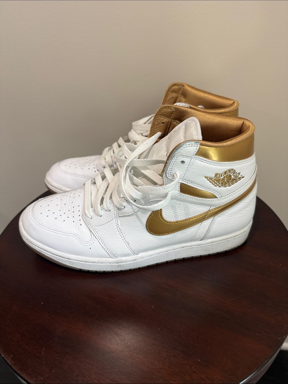 Jordan Women's High-Top Sneakers in White and Gold